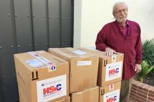 Dr. Rolfe with Henry Schein Supply Donations