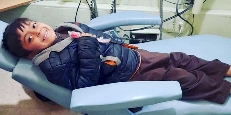 Young Boy On Dental Chair