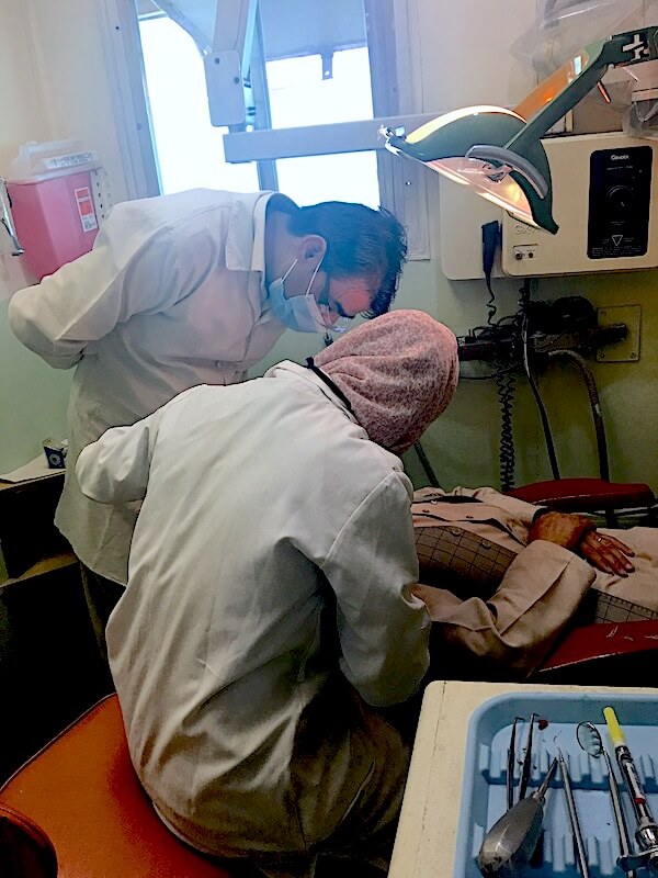 Staff Working On Patient
